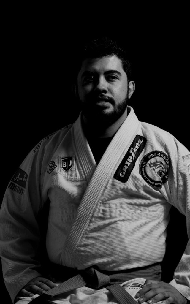 A man in a kimono is posing for a picture